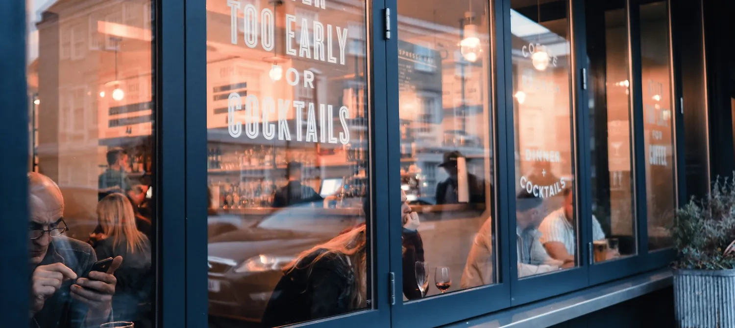 view through the window of a Cambridge kitchen and bar